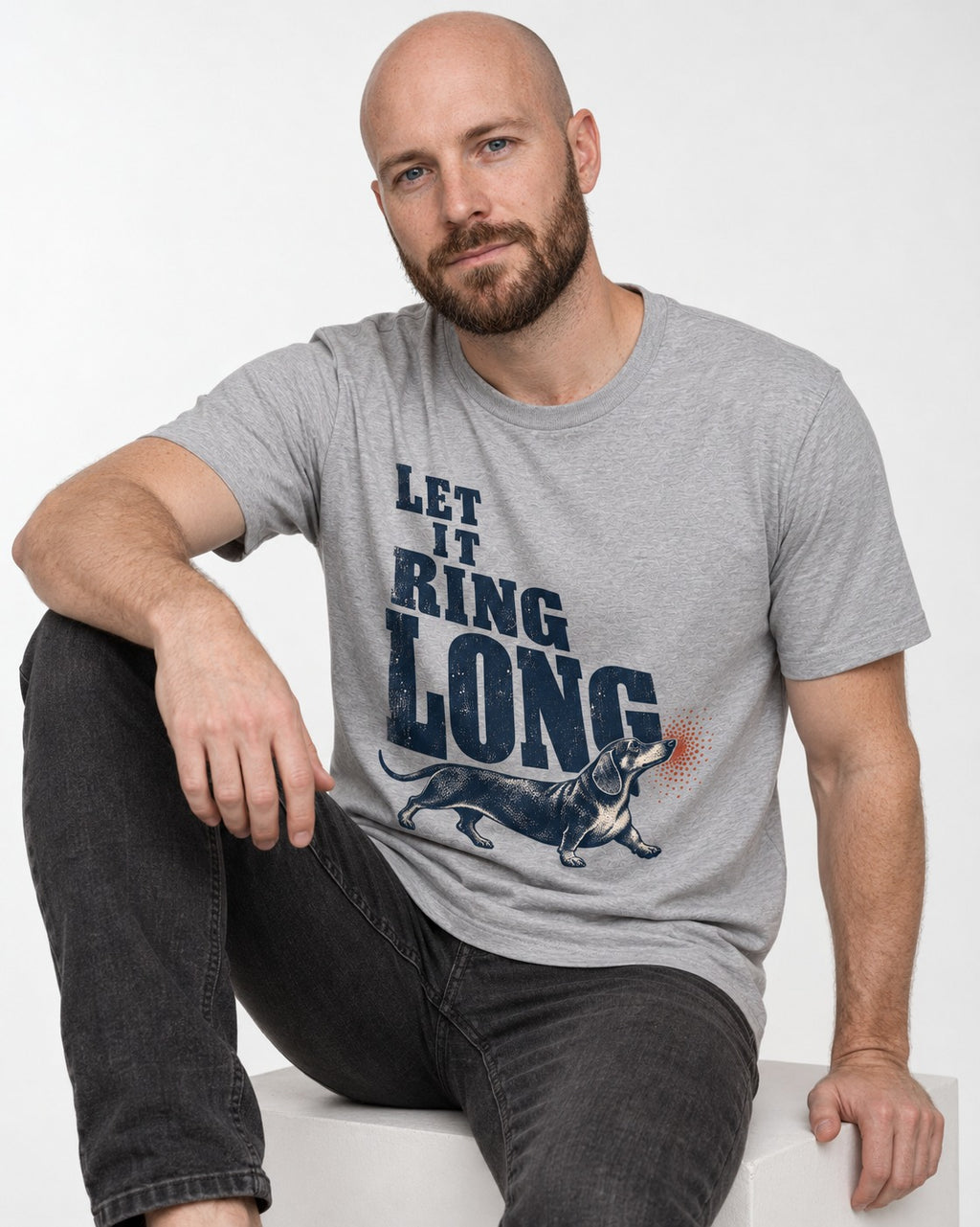 Let It Ring Long Dachshund T-Shirt in Sport Grey, worn by a seated model
