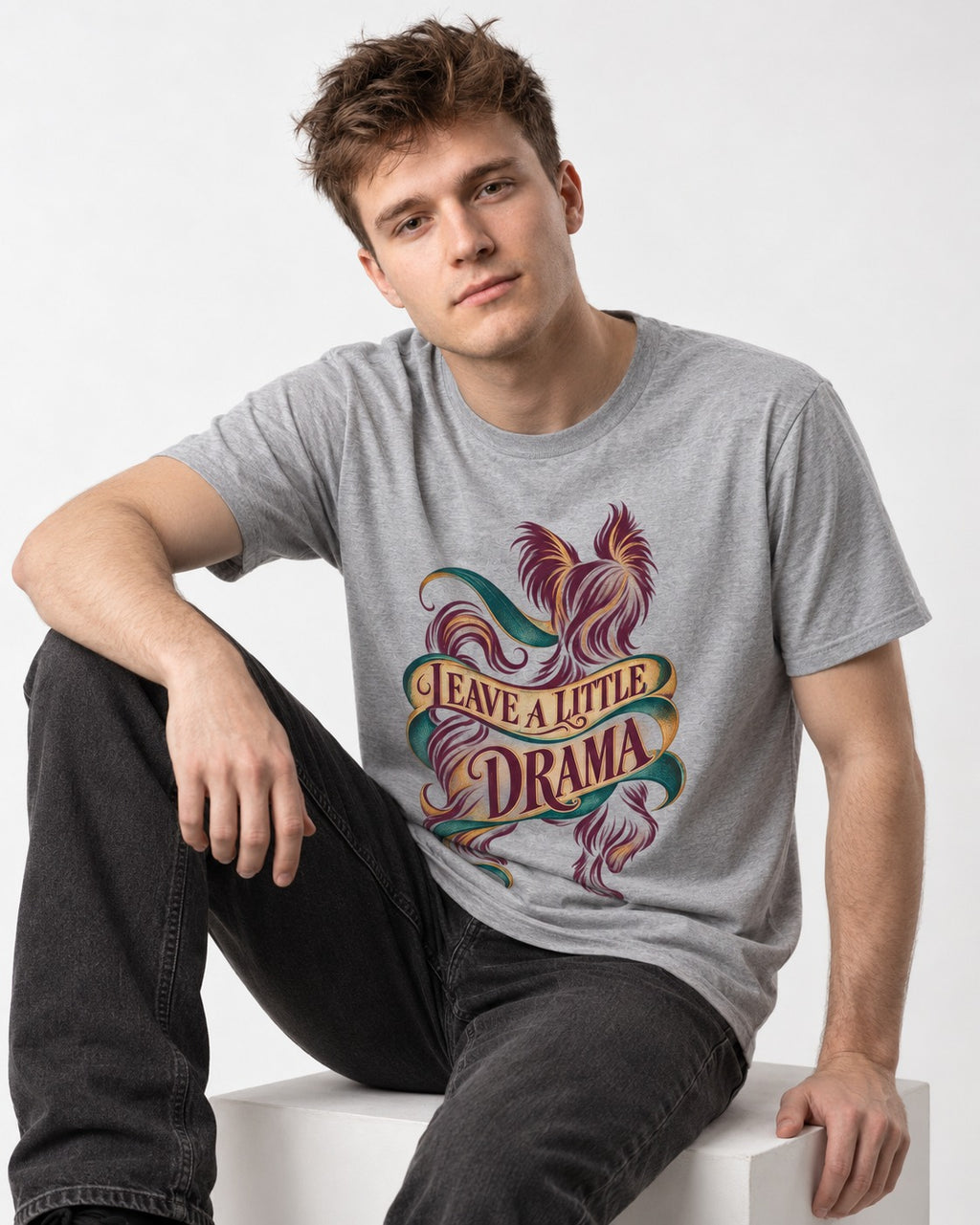 Leave a Little Drama Yorkshire Terrier T-Shirt in Sport Grey, worn by a seated model