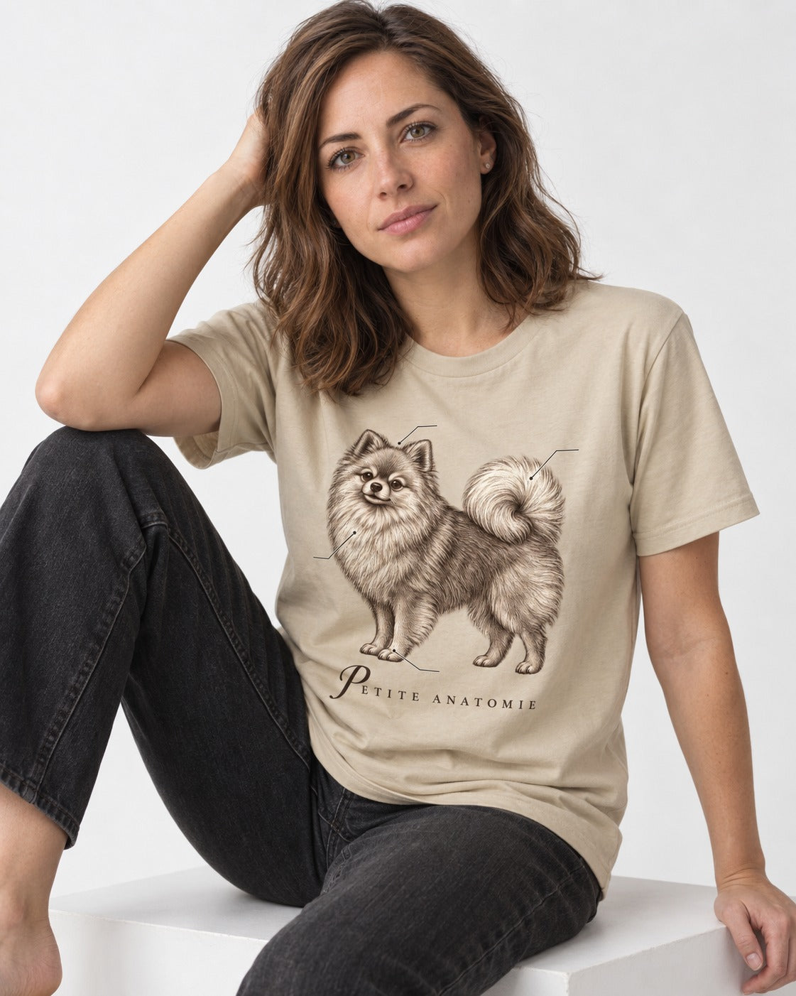 Pomeranian Petite Anatomie T-Shirt in Sand, worn by a seated model