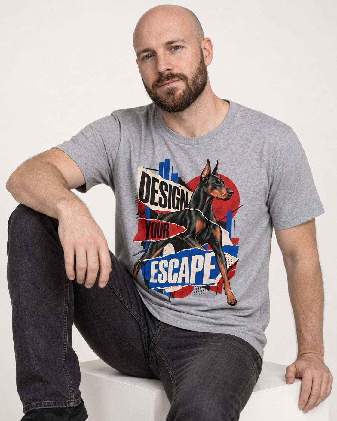 Doberman Escape T-Shirt in Sport Grey, worn by a seated model