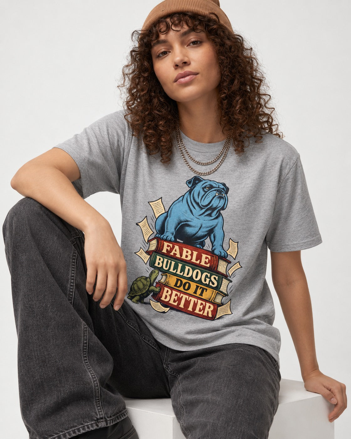English Bulldog Does It Better T-Shirt in Sport Grey, worn by a seated model