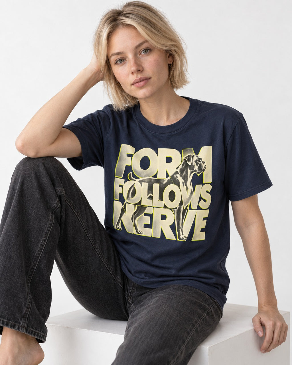Form Follows Nerve Boxer Typography T-Shirt in Navy, worn by a seated model