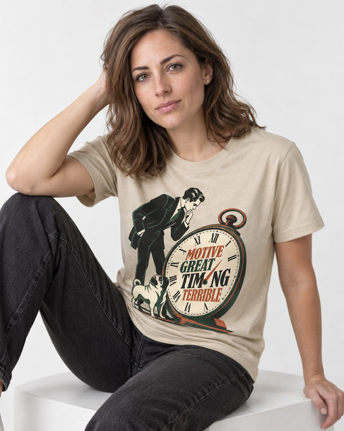 Pug Great Motive Terrible Timing T-Shirt in Sand, worn by a seated model