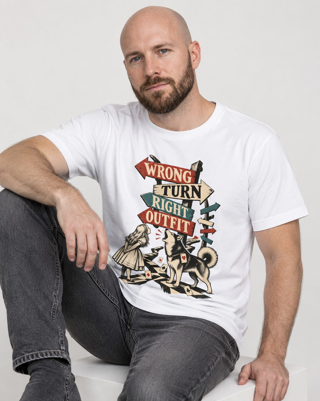 Husky Wrong Turn Right Outfit Wonderland Signpost Graphic T-Shirt in White, worn by a seated model