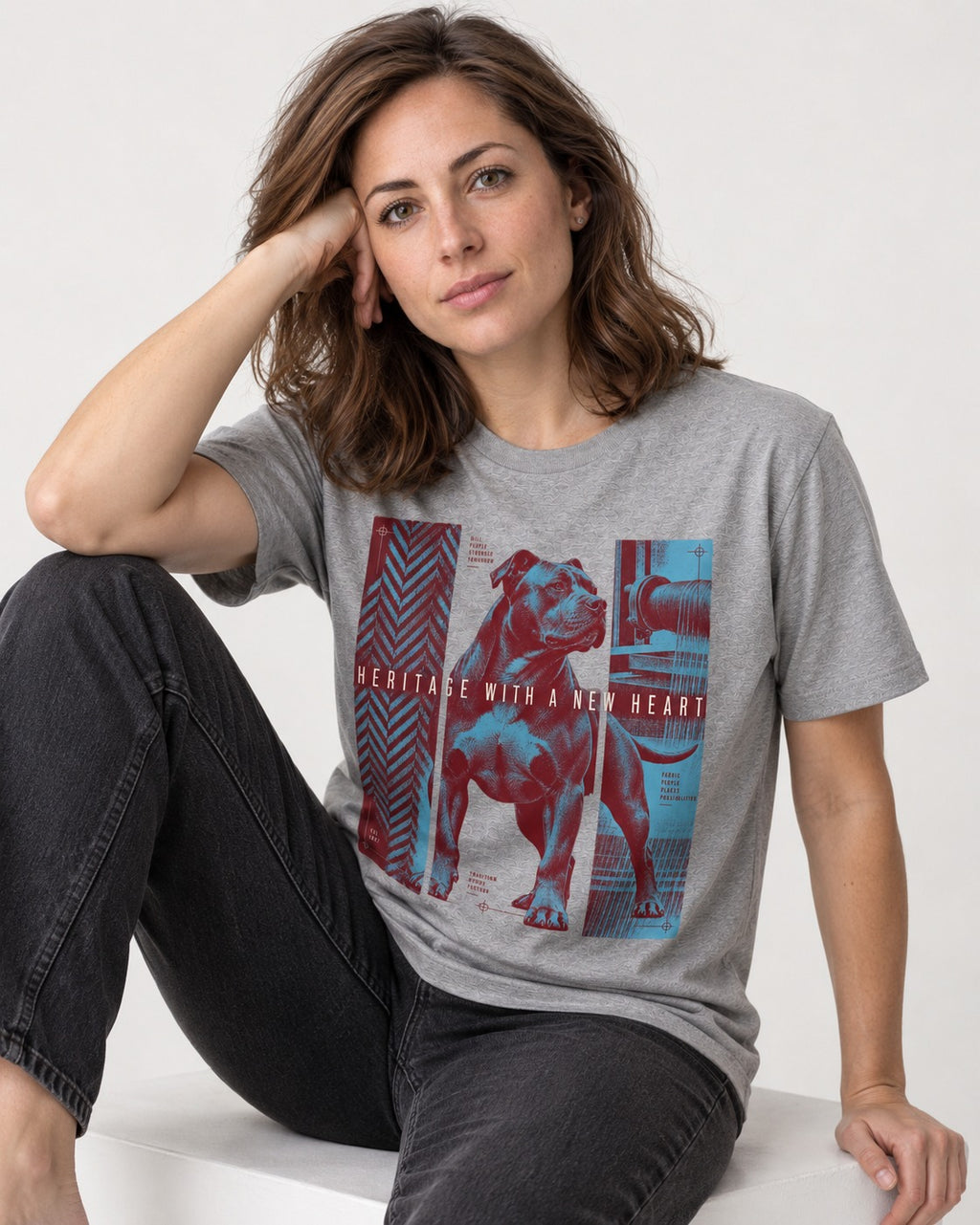 Pitbull Heritage with New Heart T-Shirt in Sport Grey, worn by a seated model