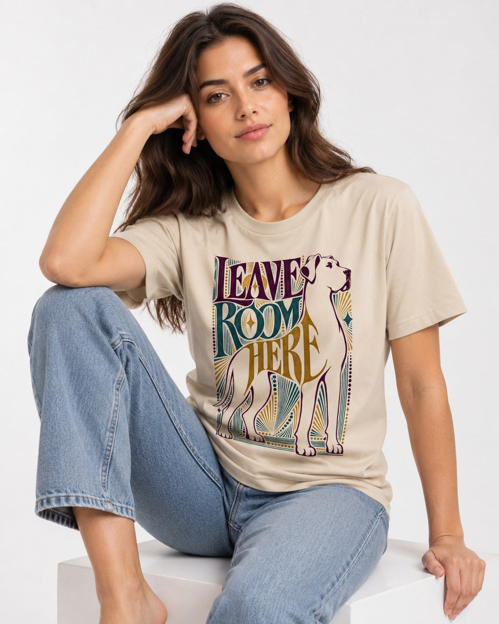Leave Room for Great Dane T-Shirt in Sand, worn by a seated model