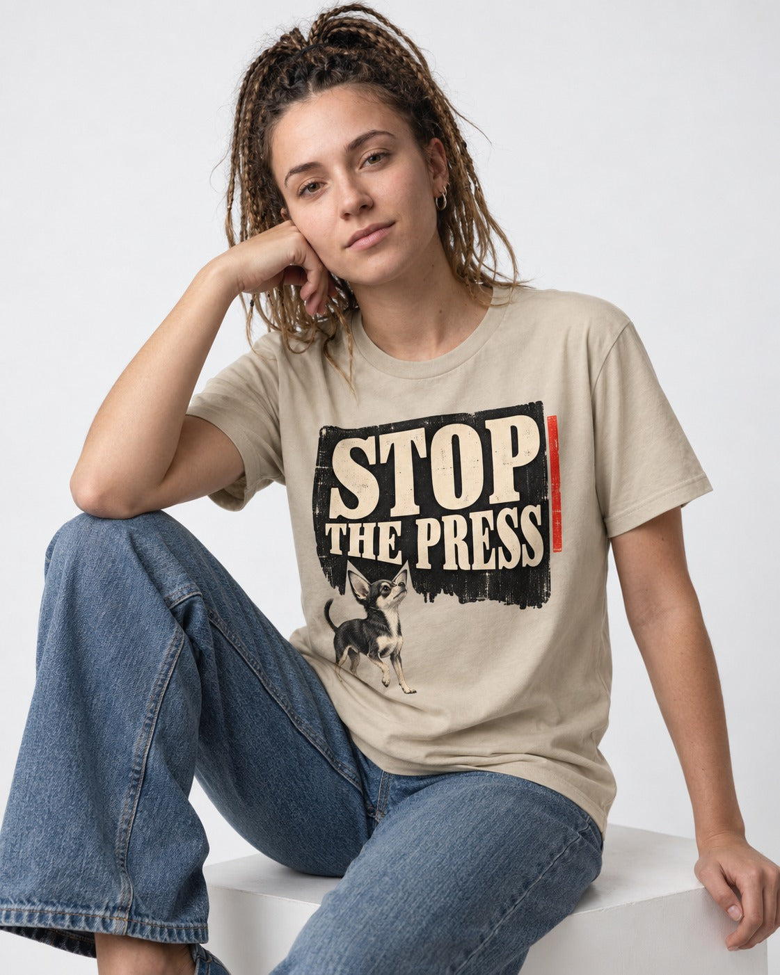 Stop the Press Chihuahua T-Shirt in Sand, worn by a seated model