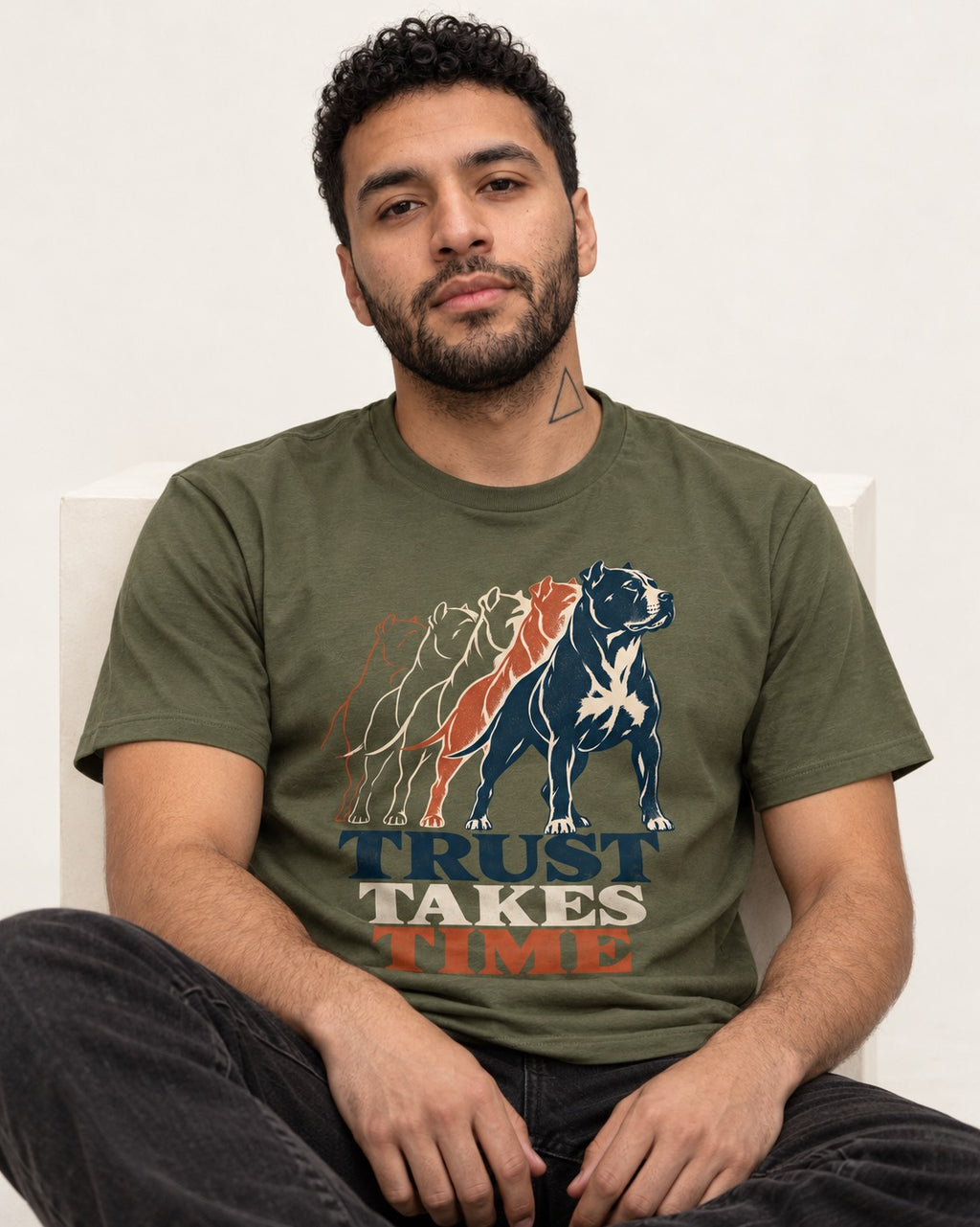 Pitbull Trust Takes Time Progression Graphic T-Shirt in Heather Military Green, worn by a seated model
