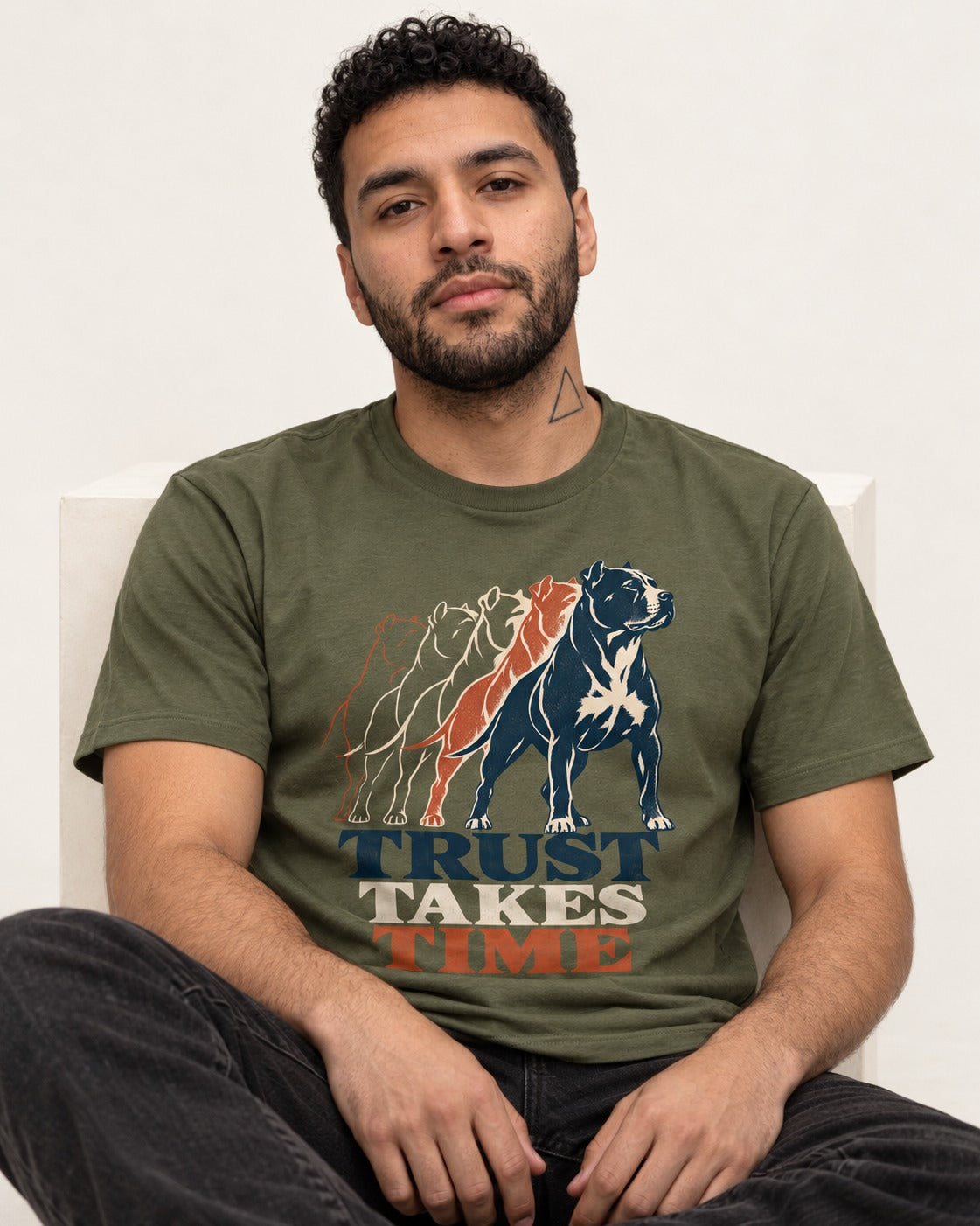Pitbull Trust Takes Time Progression Graphic T-Shirt in Heather Military Green, worn by a seated model