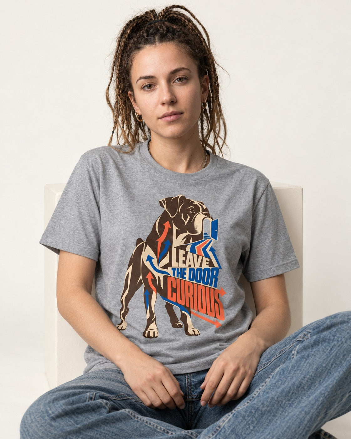 Leave the Door Curious Boxer Doorway Arrow Graphic T-Shirt in Sport Grey, worn by a seated model