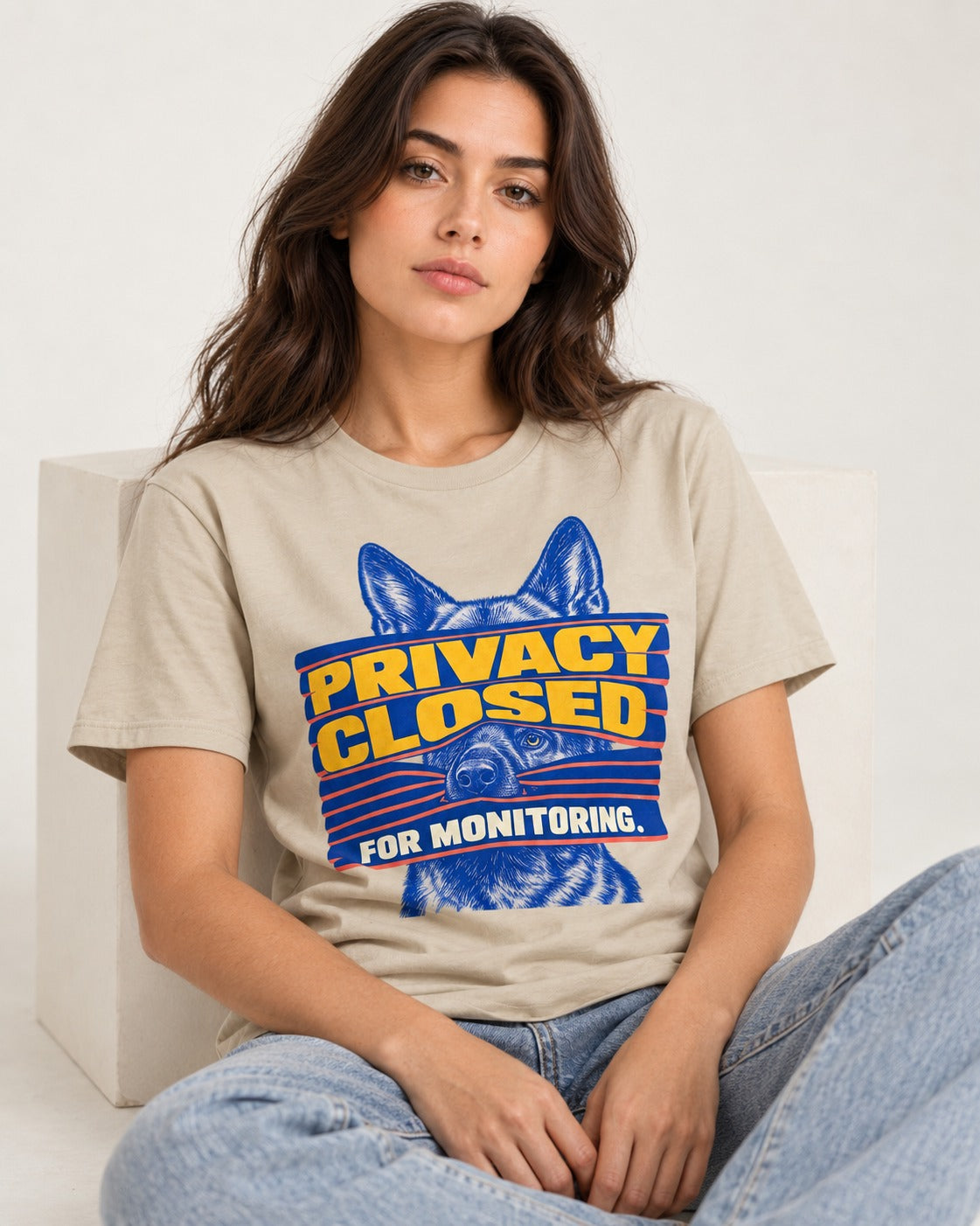 German Shepherd Dog Privacy Closed for Monitoring T-Shirt in Sand, worn by a seated model