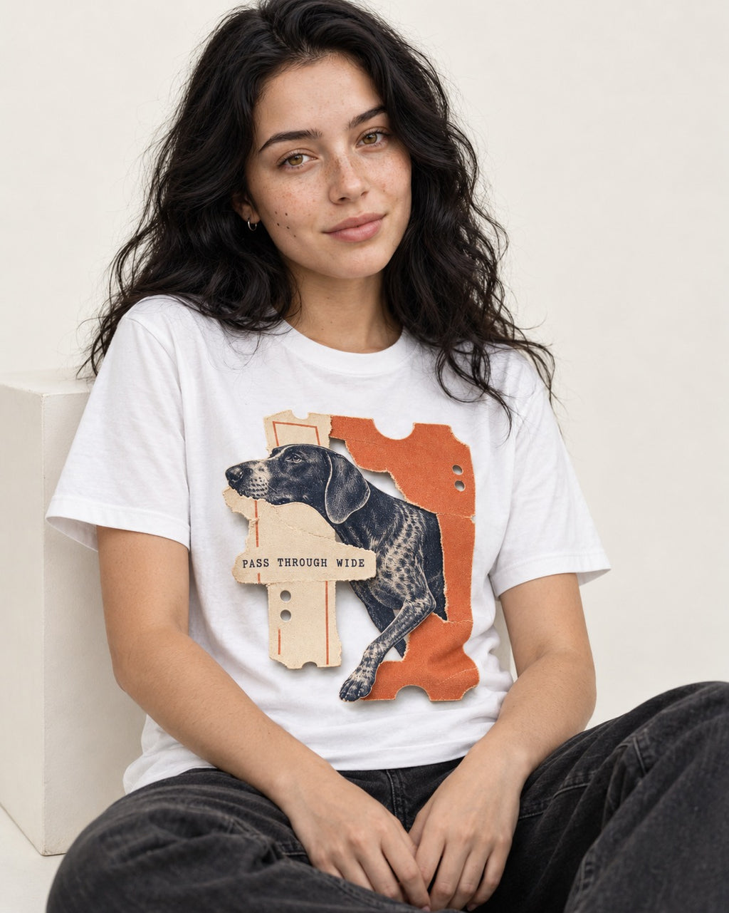 German Shorthaired Pointer Pass Through Wide Ticket Graphic T-Shirt in White, worn by a seated model