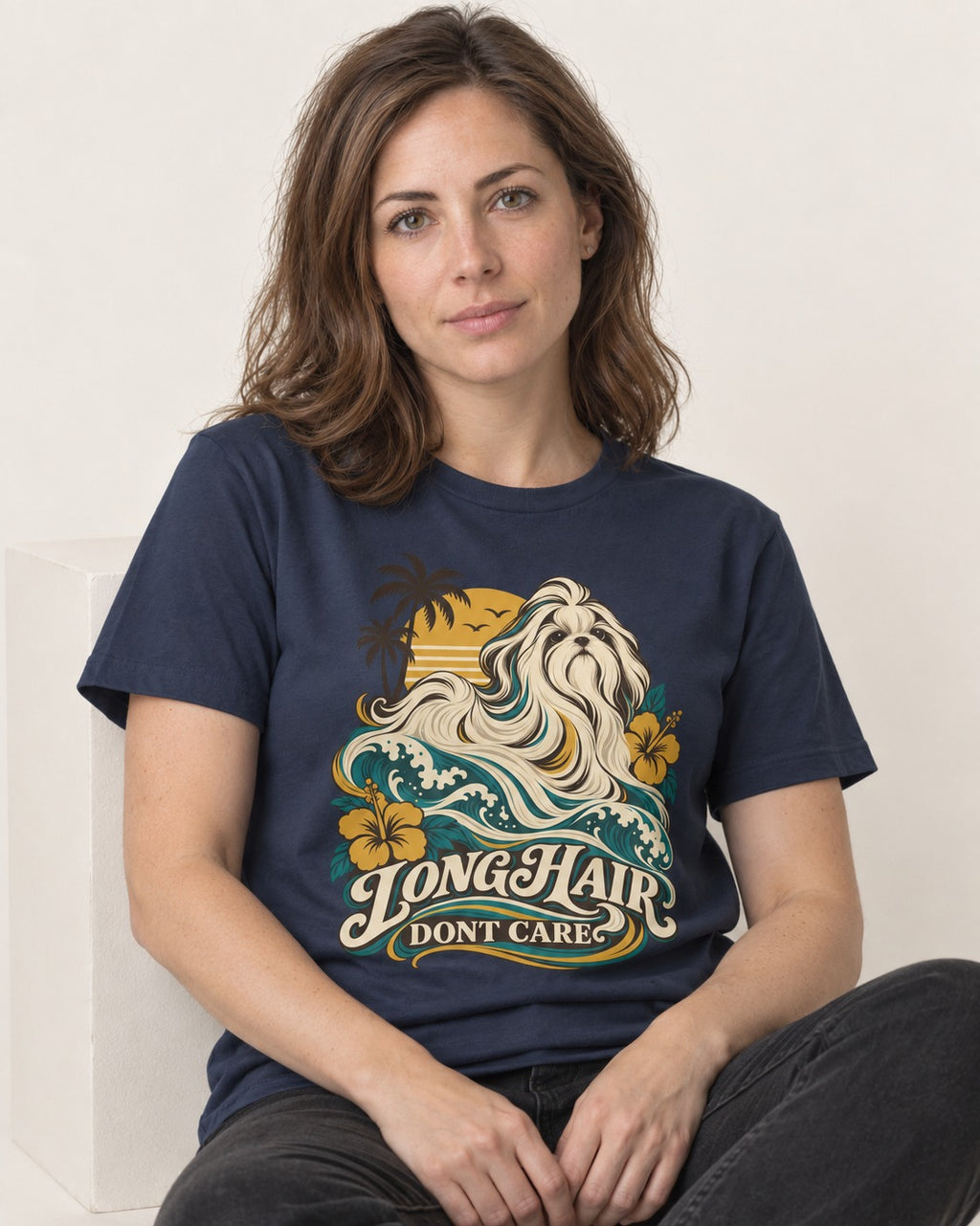 Shih Tzu Long Hair Don't Care Tropical Wave Graphic T-Shirt in Navy, worn by a seated model