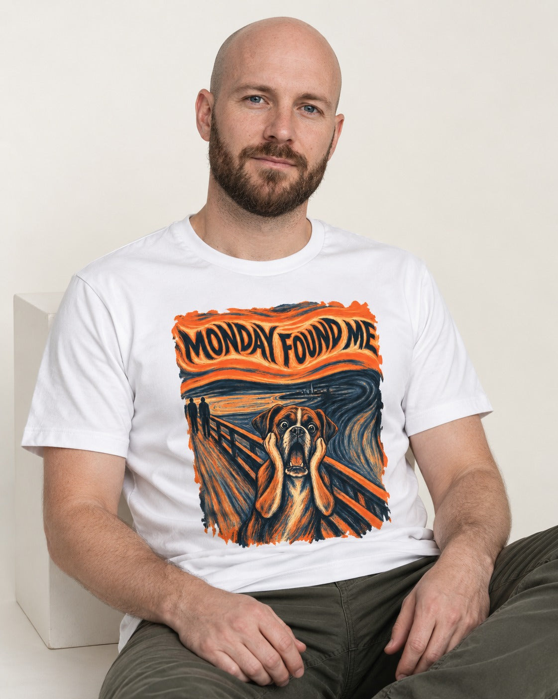 Monday Found Me Scream Boxer T-Shirt in White, worn by a seated model