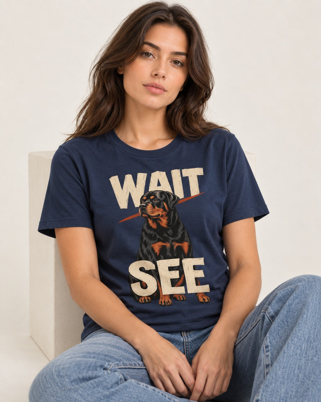 Wait See Rottweiler Seated Slash Graphic T-Shirt in Navy, worn by a seated model