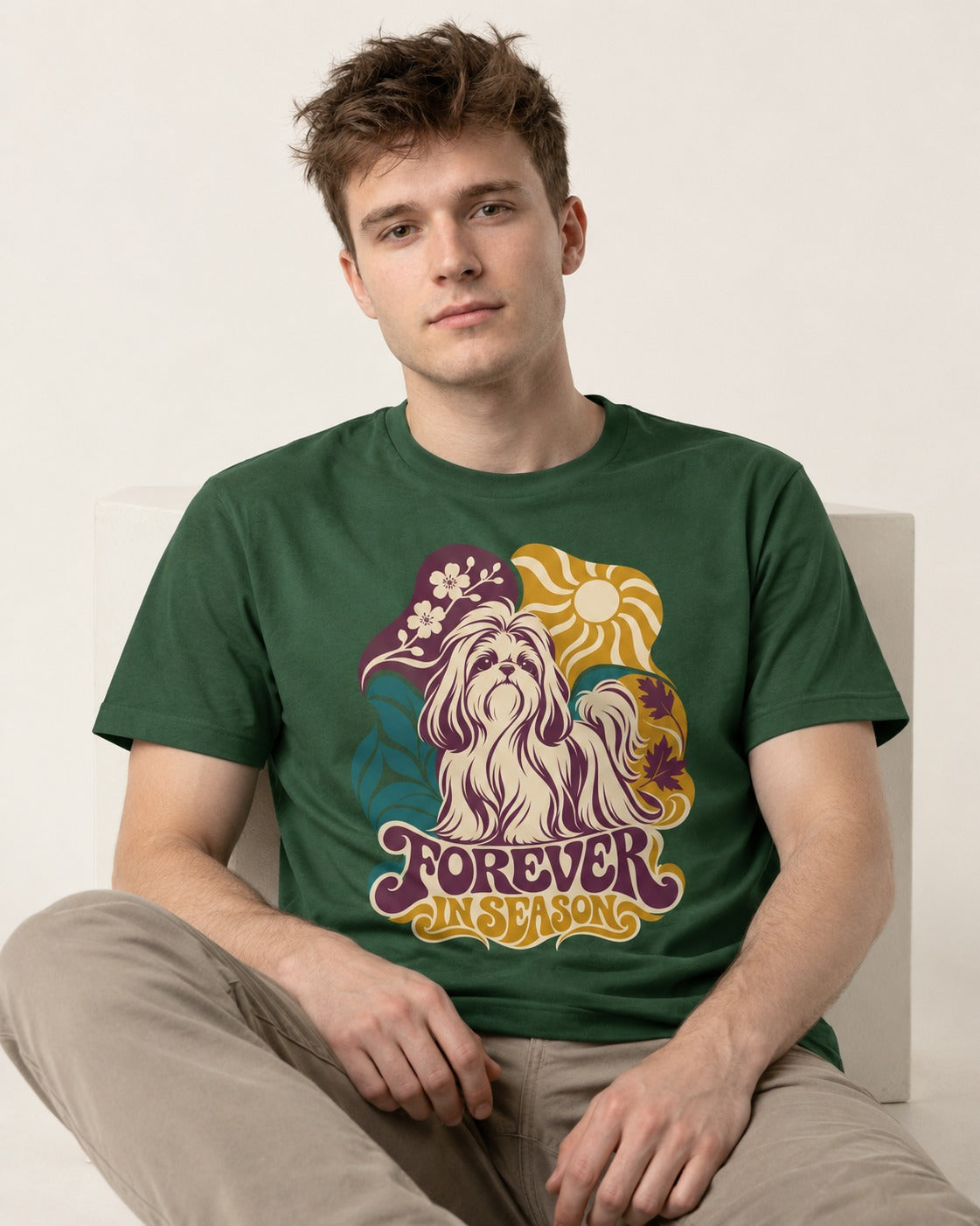 Shih Tzu Forever in Season Botanical Sun Graphic T-Shirt in Forest Green, worn by a seated model