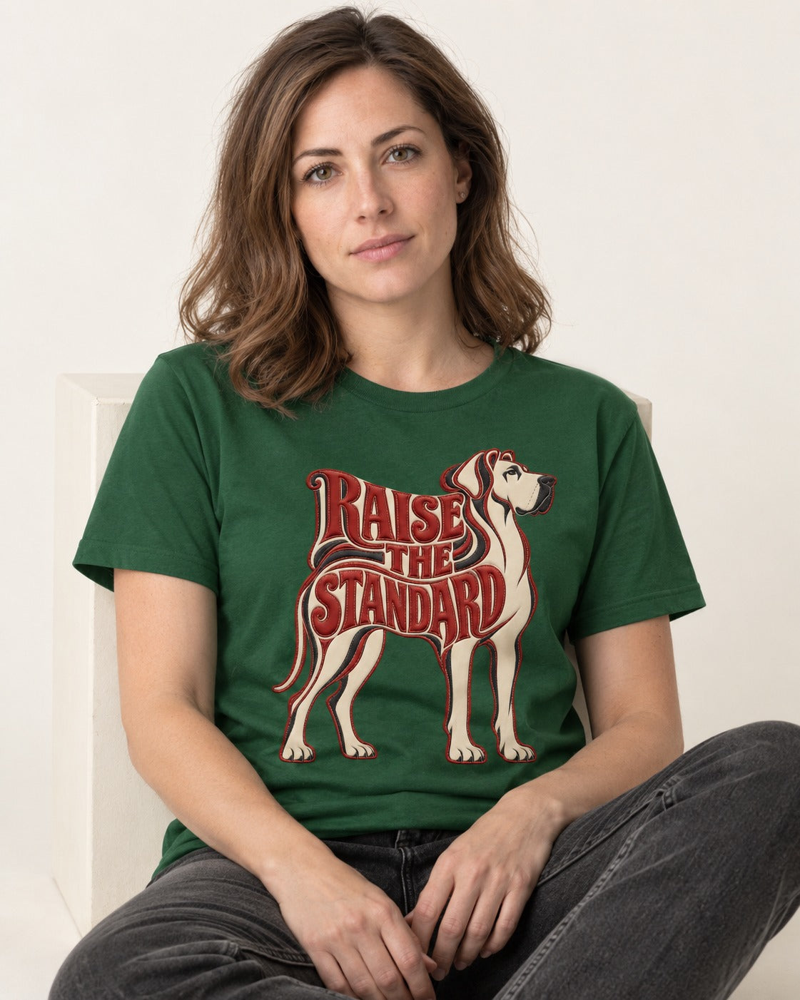 Great Dane Raise the Standard Typography Graphic T-Shirt in Forest Green, worn by a seated model