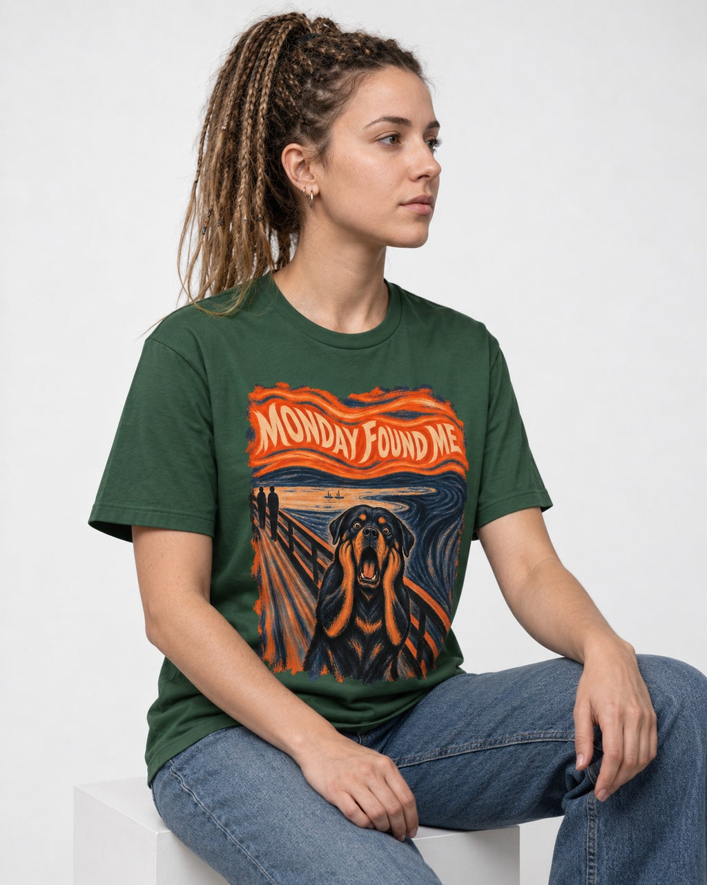 Rottweiler Monday Found Me Scream Parody Graphic T-Shirt in Forest Green, worn by a seated model