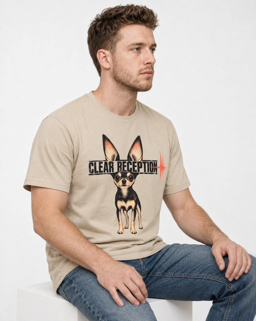 Chihuahua Clear Reception T-Shirt in Sand, worn by a seated model