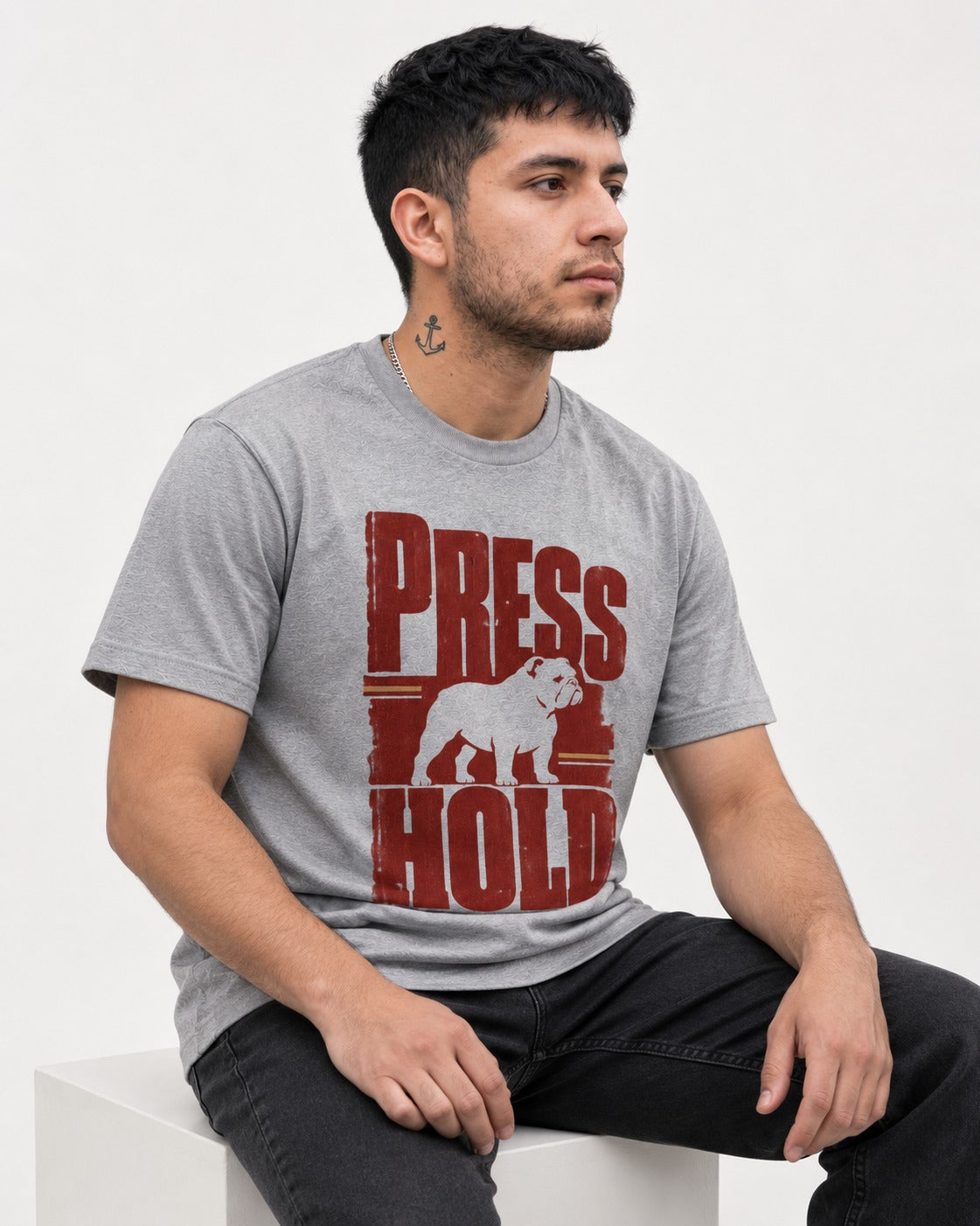 English Bulldog Press and Hold T-Shirt in Sport Grey, worn by a seated model