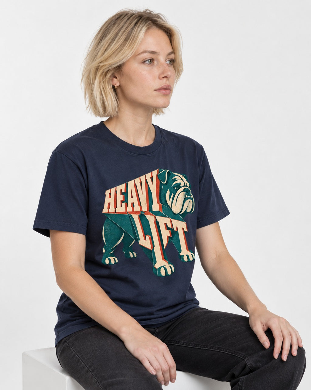 English Bulldog Heavy Lift Dimensional Type T-Shirt in Navy, worn by a seated model