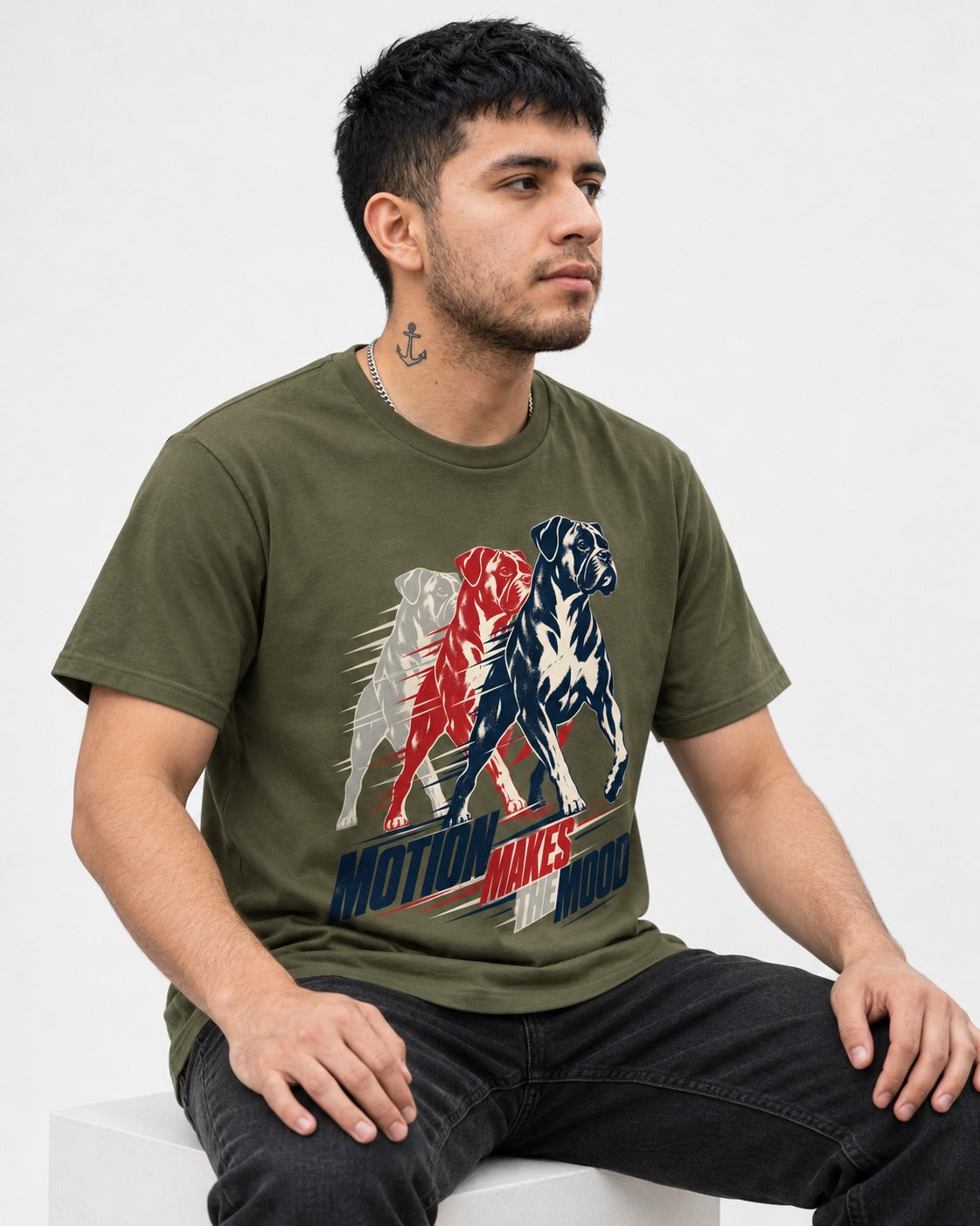 Boxer Motion Makes the Mood T-Shirt in Heather Military Green, worn by a seated model
