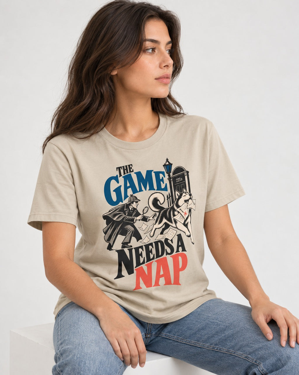 Husky Needs a Nap T-Shirt in Sand, worn by a seated model