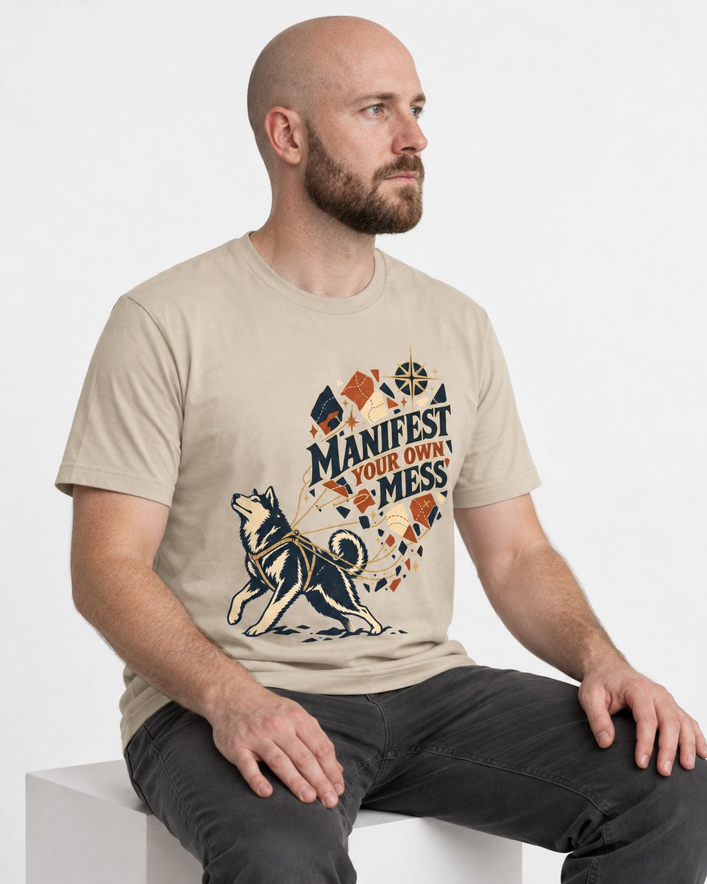 Husky Manifest Your Own Mess T-Shirt in Sand, worn by a seated model