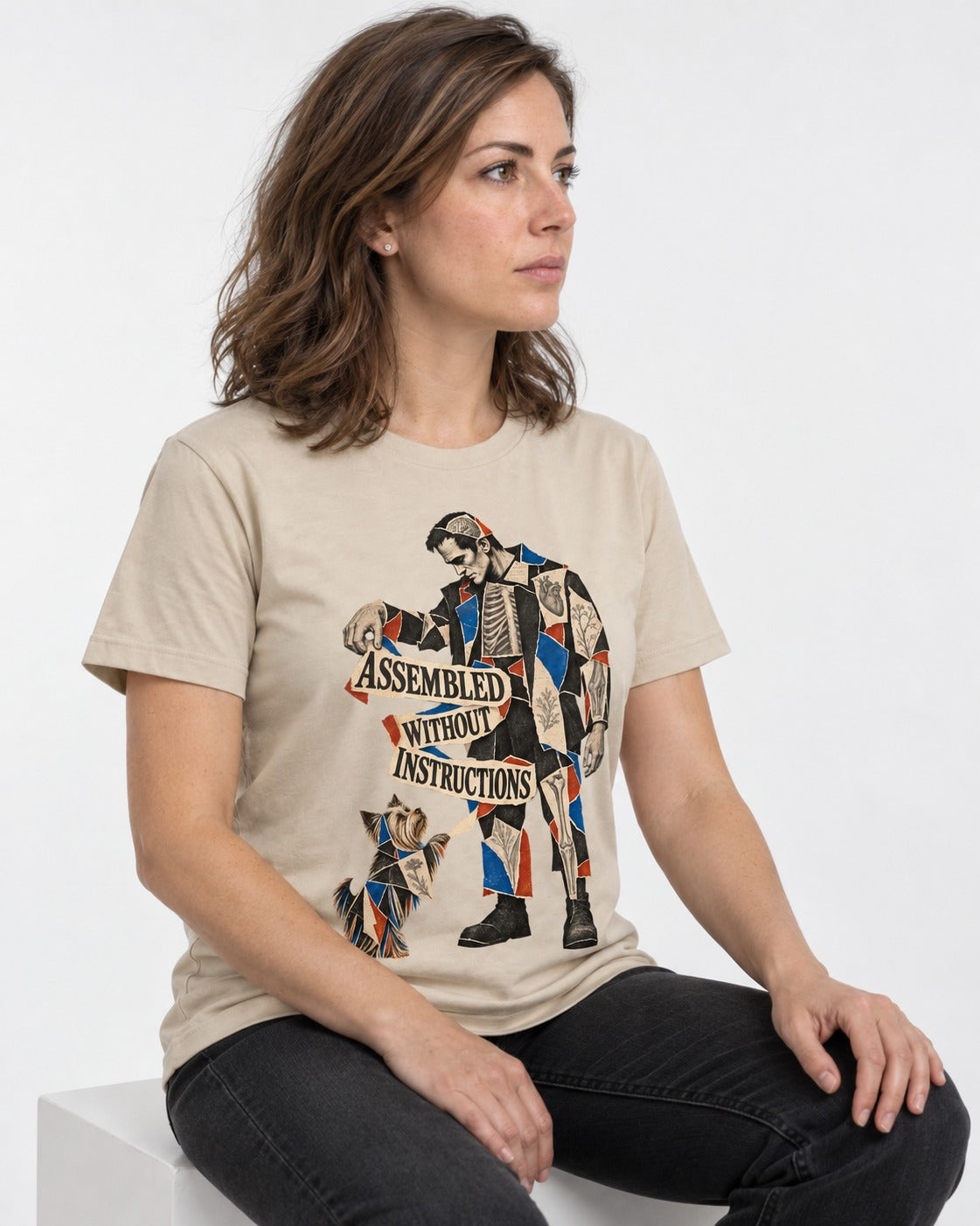 Yorkshire Terrier Assembled Without Instructions T-Shirt in Sand, worn by a seated model