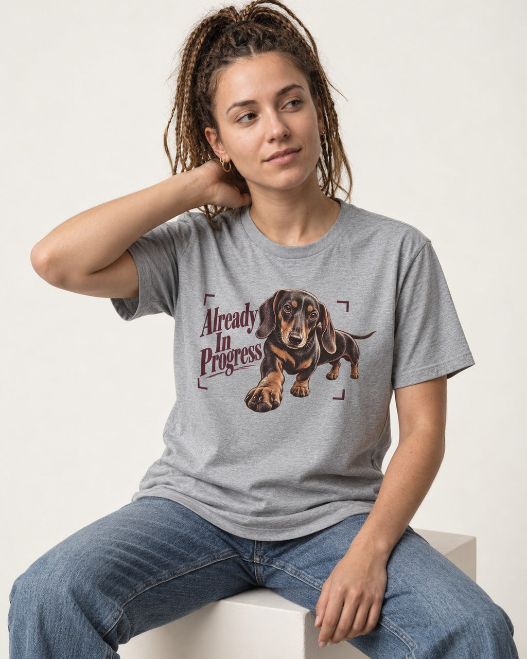Dachshund Already in Progress T-Shirt in Sport Grey, worn by a seated model