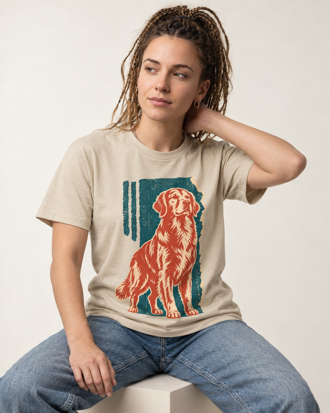 Golden Retriever Steadfast Heart T-Shirt in Sand, worn by a seated model