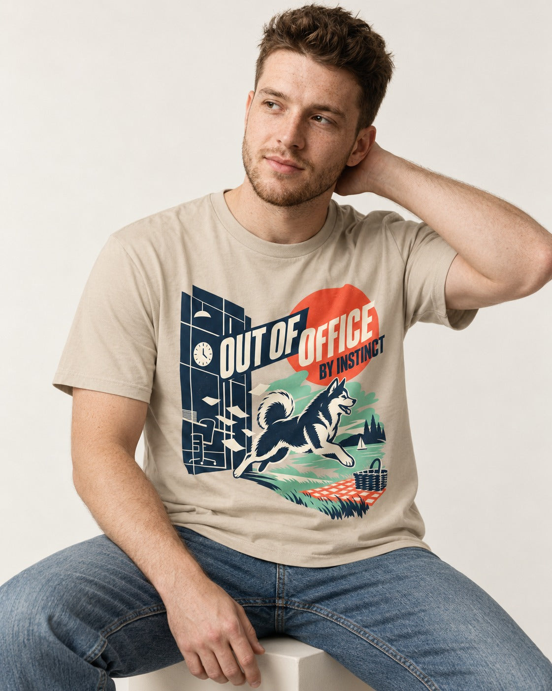Husky Out of Office T-Shirt in Sand, worn by a seated model