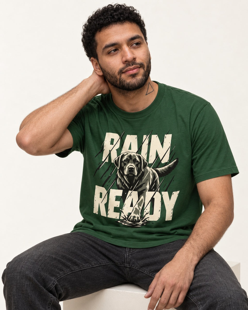 Labrador Retriever Rain Ready Charging Splash Graphic T-Shirt in Forest Green, worn by a seated model