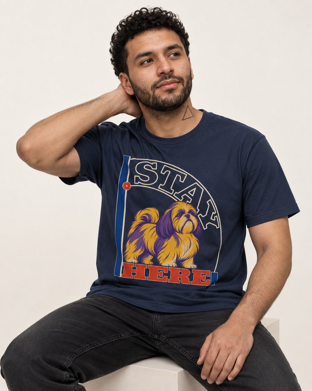Shih Tzu Stay Here Semicircle Sign Graphic T-Shirt in Navy, worn by a seated model