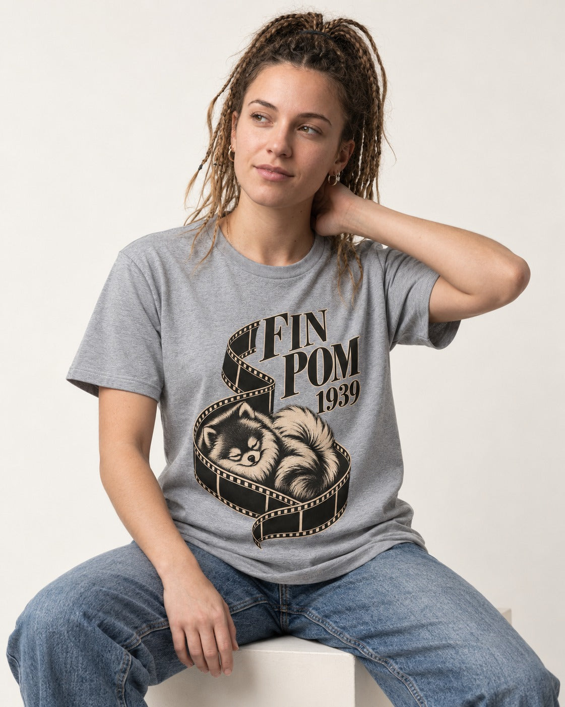 Fin Pomeranian T-Shirt in Sport Grey, worn by a seated model