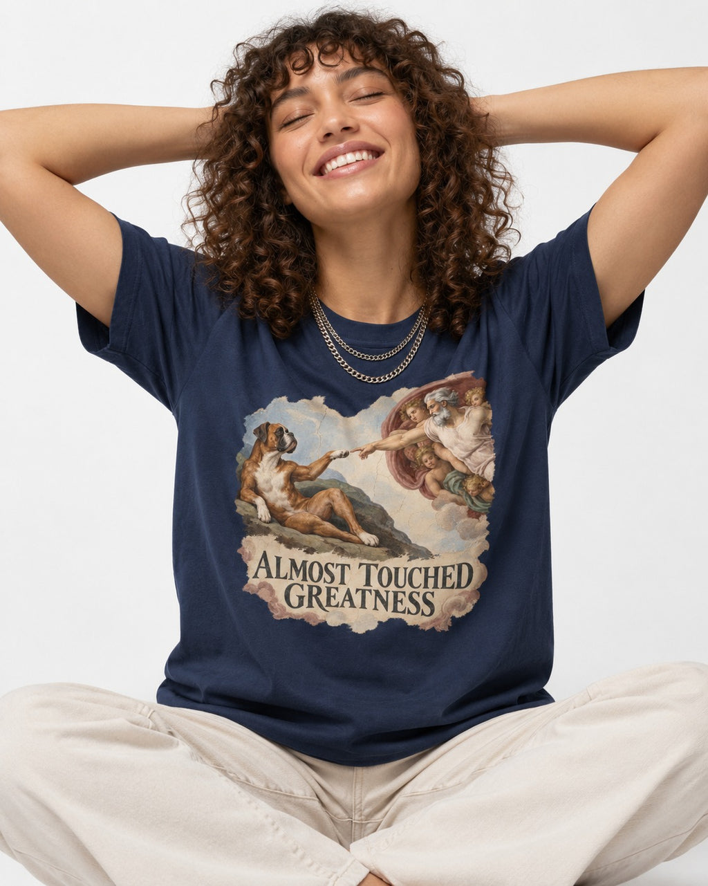 Almost Touched Greatness Boxer Creation Fresco Graphic T-Shirt in Navy, worn by a seated model