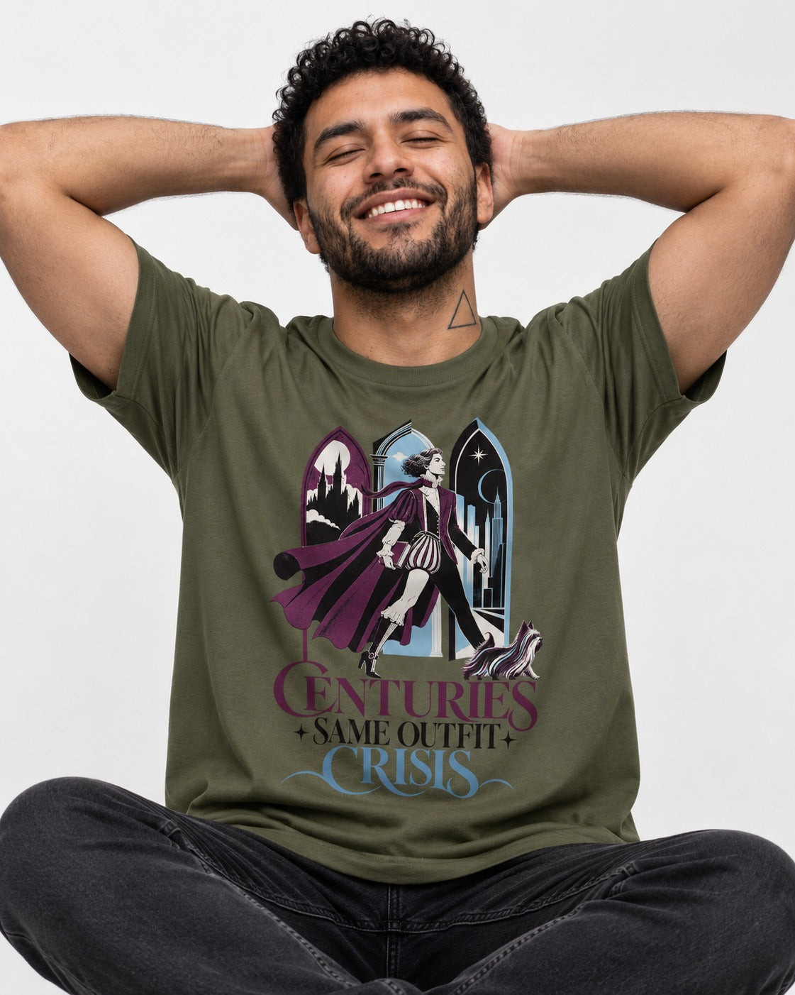 Yorkshire Terrier Centuries Same Outfit Crisis Gothic Graphic T-Shirt in Heather Military Green, worn by a seated model