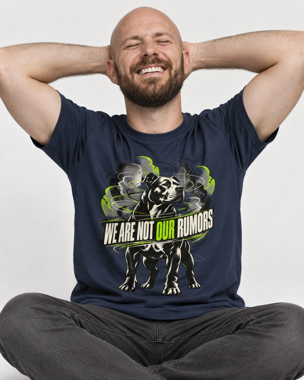 Pitbull We Are Not Our Rumors Swirling Voices Graphic T-Shirt in Navy, worn by a seated model