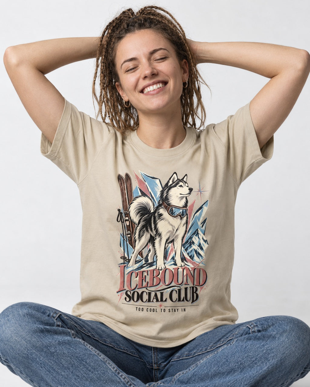 Icebound Husky T-Shirt in Sand, worn by a seated model