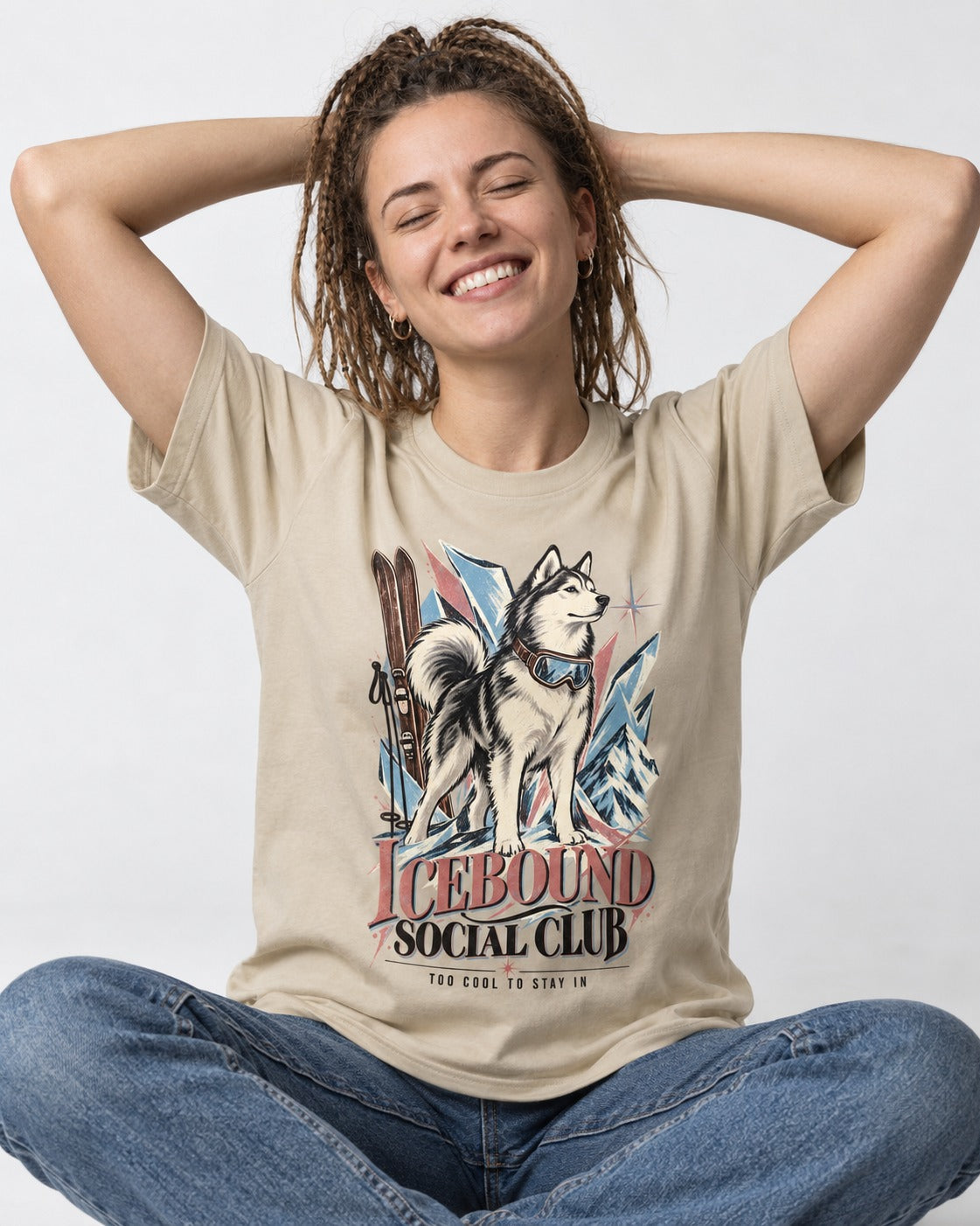 Icebound Husky T-Shirt in Sand, worn by a seated model