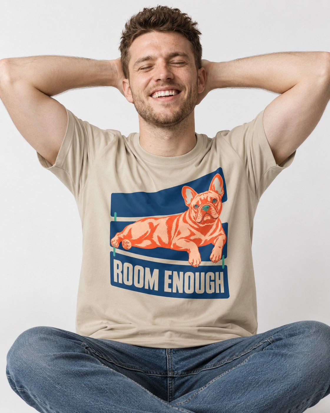 Room Enough for Frenchie T-Shirt in Sand, worn by a seated model