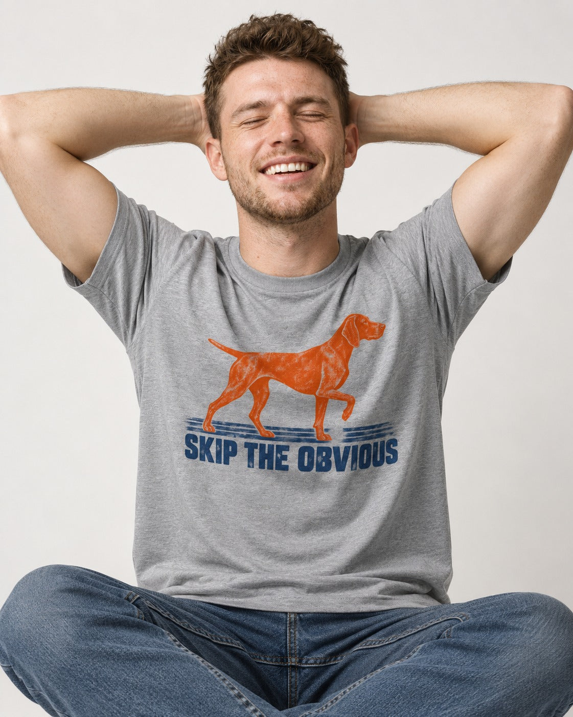 Skip the Obvious German Shorthaired Pointer T-Shirt in Sport Grey, worn by a seated model