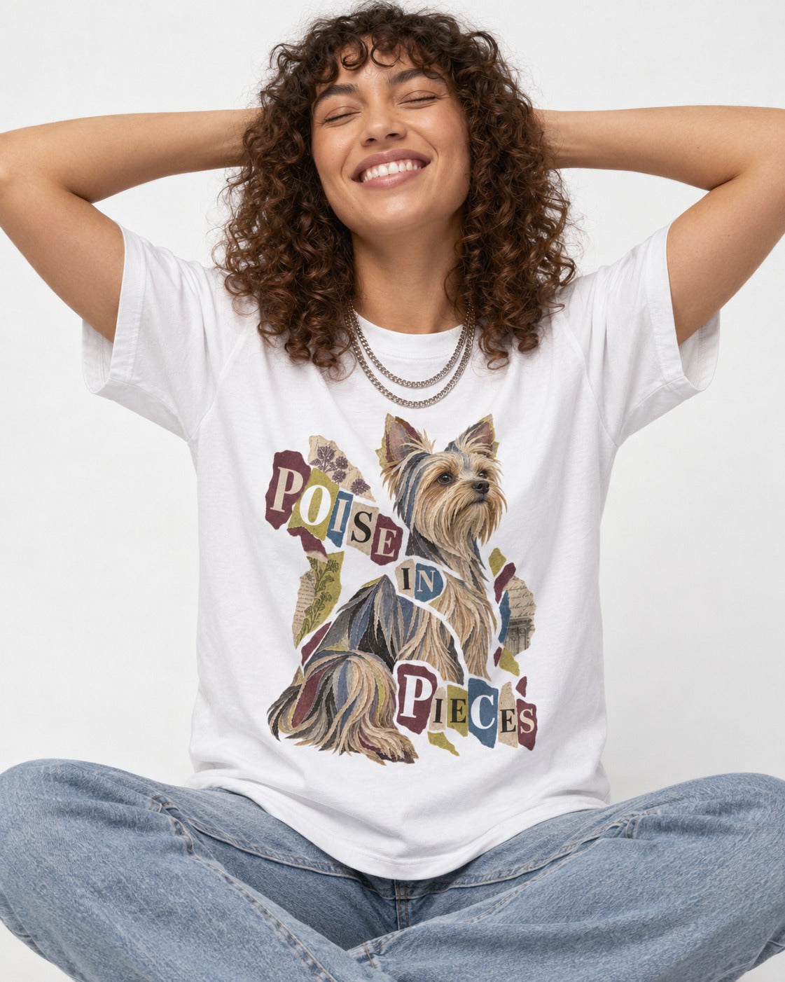 Yorkshire Terrier Poise in Pieces Torn Paper Collage Graphic T-Shirt in White, worn by a seated model