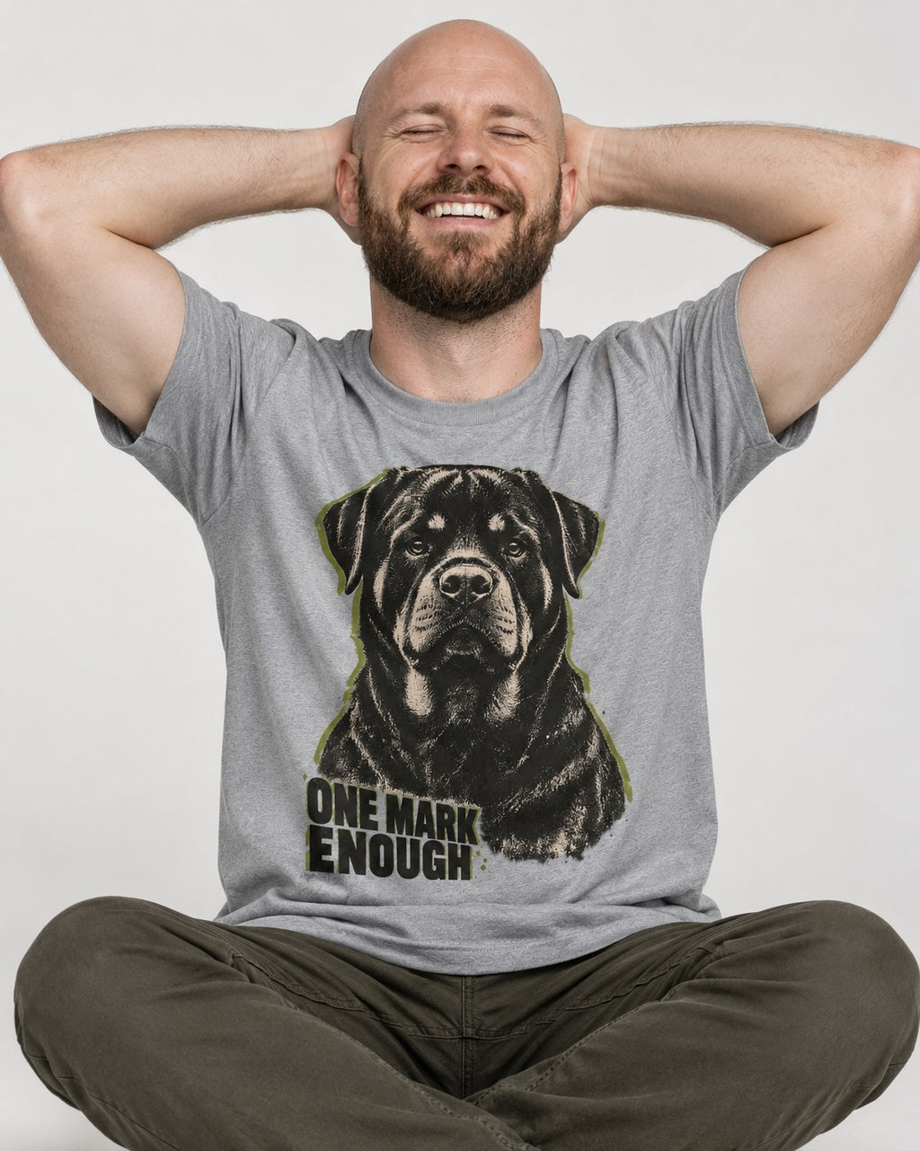 Rottweiler One Mark Enough T-Shirt in Sport Grey, worn by a seated model