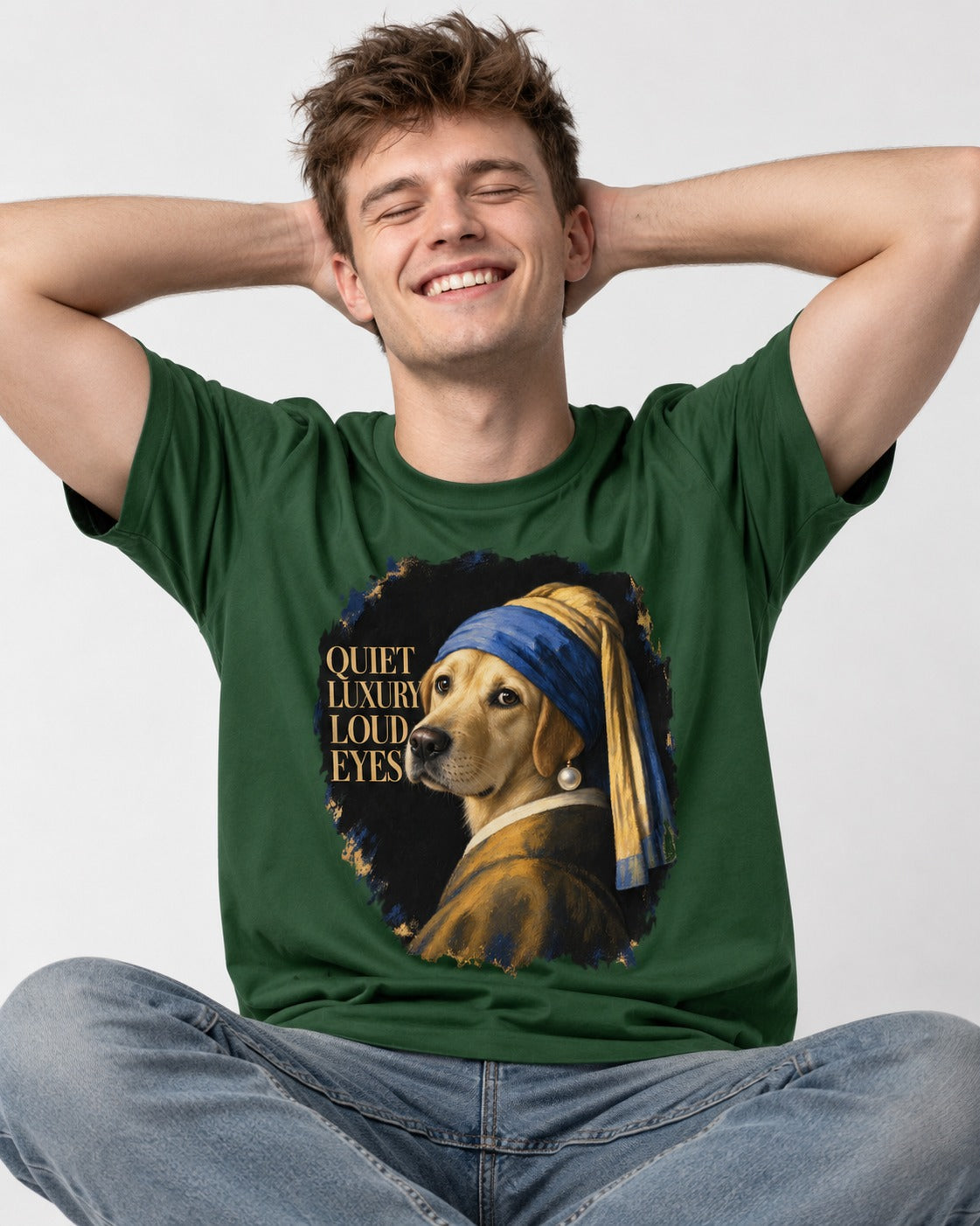 Labrador Retriever Quiet Luxury Loud Eyes Pearl Earring Graphic T-Shirt in Forest Green, worn by a seated model