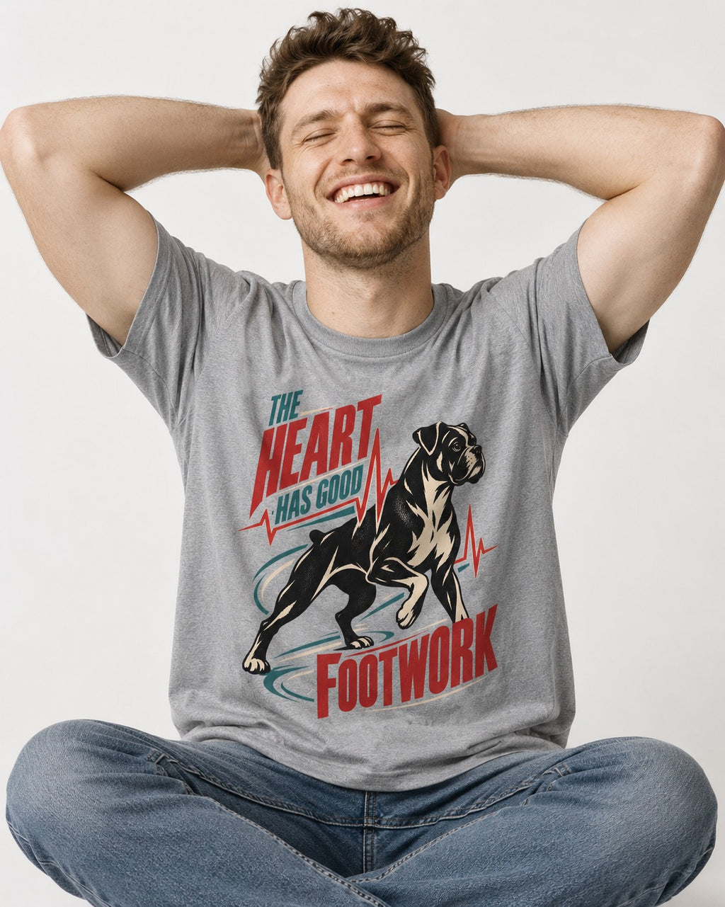 Boxer Heart Has Good Footwork T-Shirt in Sport Grey, worn by a seated model