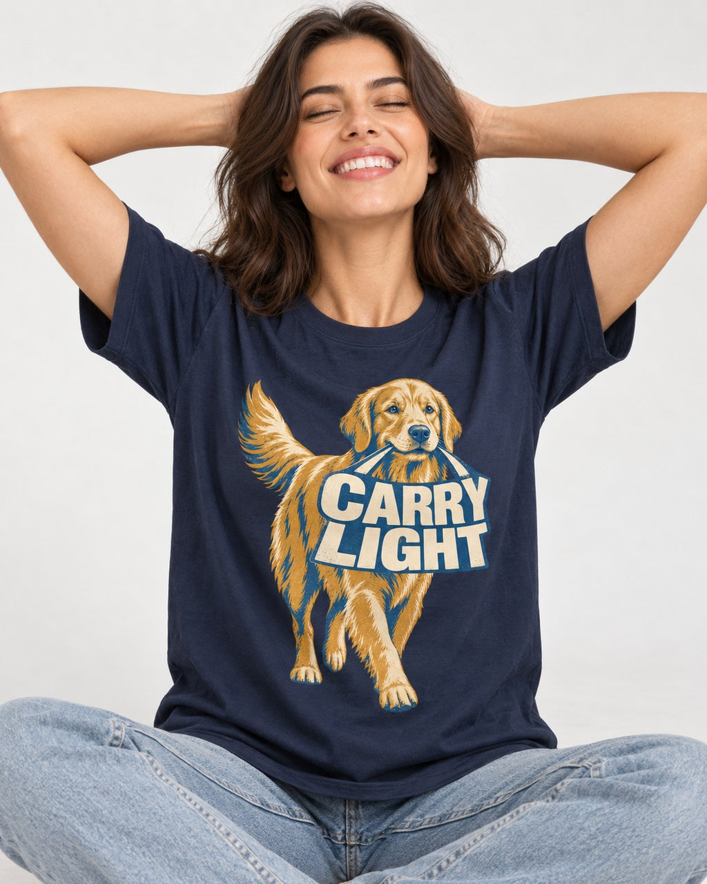Golden Retriever Carry Light Sign Graphic T-Shirt in Navy, worn by a seated model