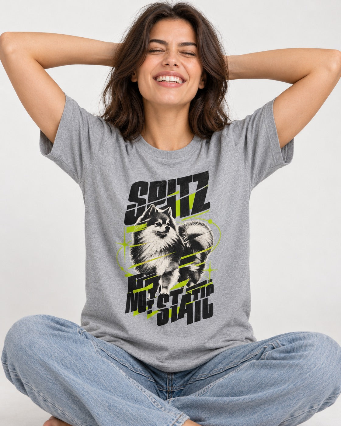 Pomeranian Not Static T-Shirt in Sport Grey, worn by a seated model