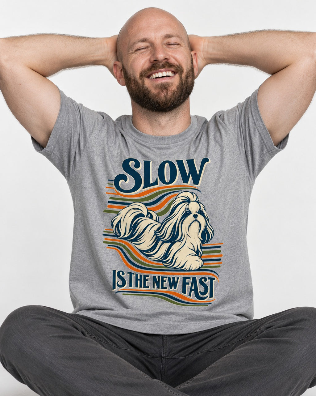 Slow Is Fast Shih Tzu T-Shirt in Sport Grey, worn by a seated model