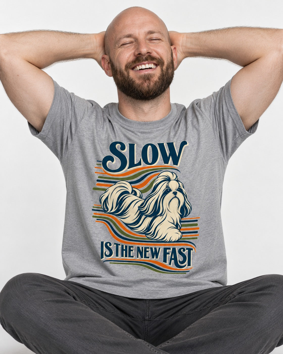 Slow Is Fast Shih Tzu T-Shirt in Sport Grey, worn by a seated model